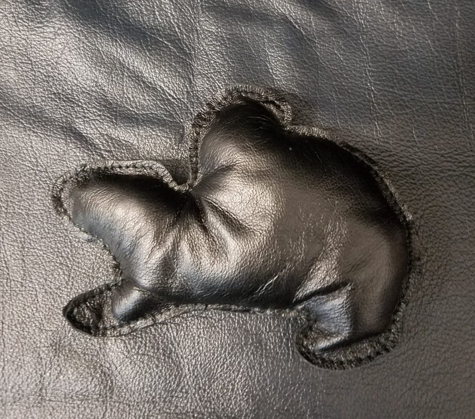 how to stop fake leather from squeaking